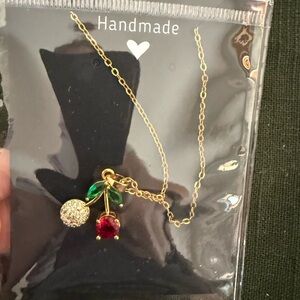 Gold Cherry Necklace with Red and Green Accents